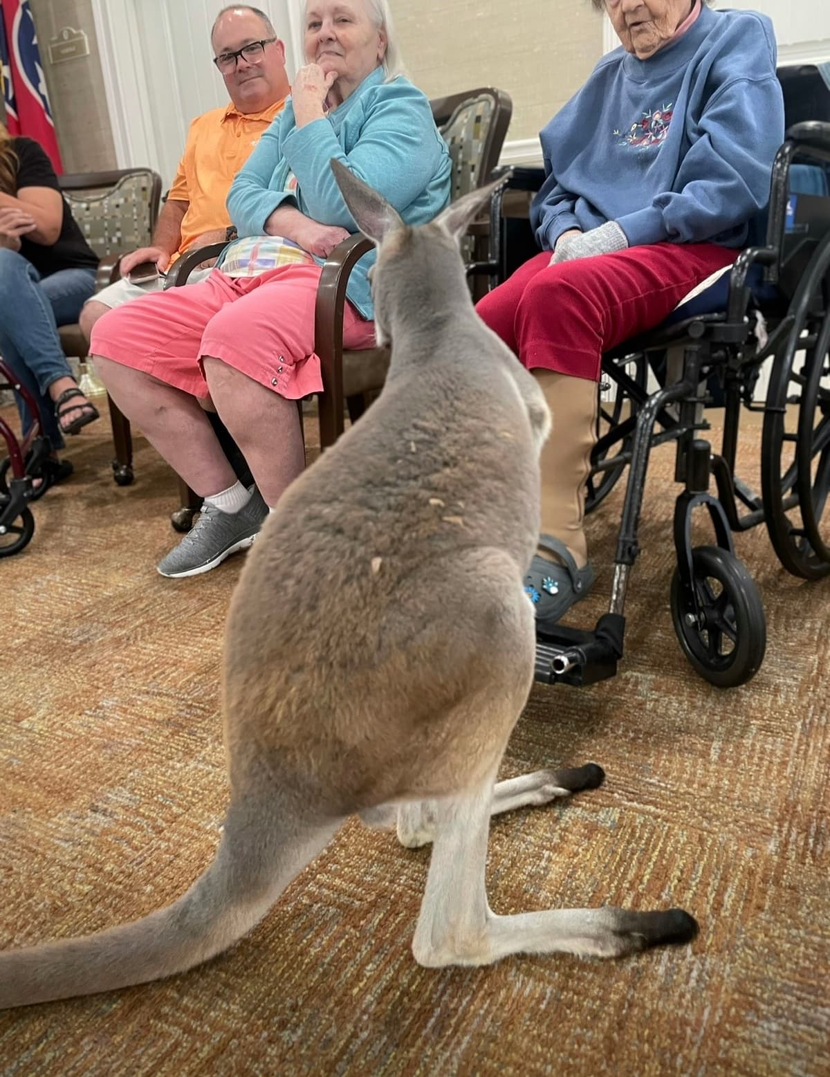 Residents smiling at kangaroo